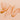 Close-up of copper liquid swatch on a matching background
