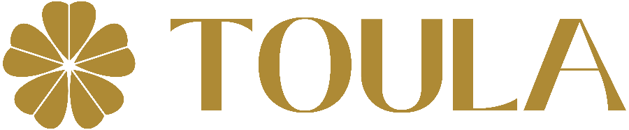 Gold logo with the word 'TOULA' and a floral design.