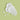 White cream on a light green background