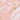 Close-up of a dropper with clear liquid on a pink background