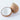Coconut split open on a white background