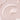 Close-up of a white cream or paint swatch on a light pink background