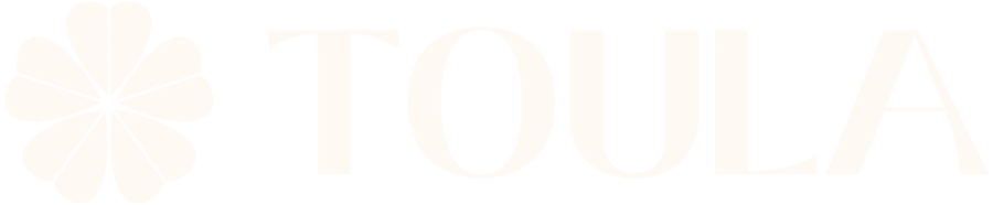 Gold logo with the word 'TOULA' and a floral design.